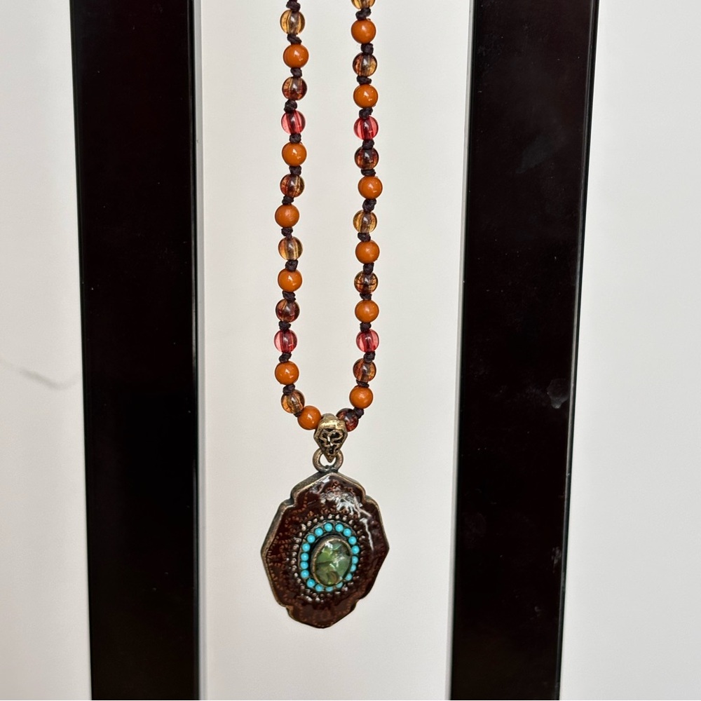 Pendant necklace with orange beaded chain/measures 14 in total length